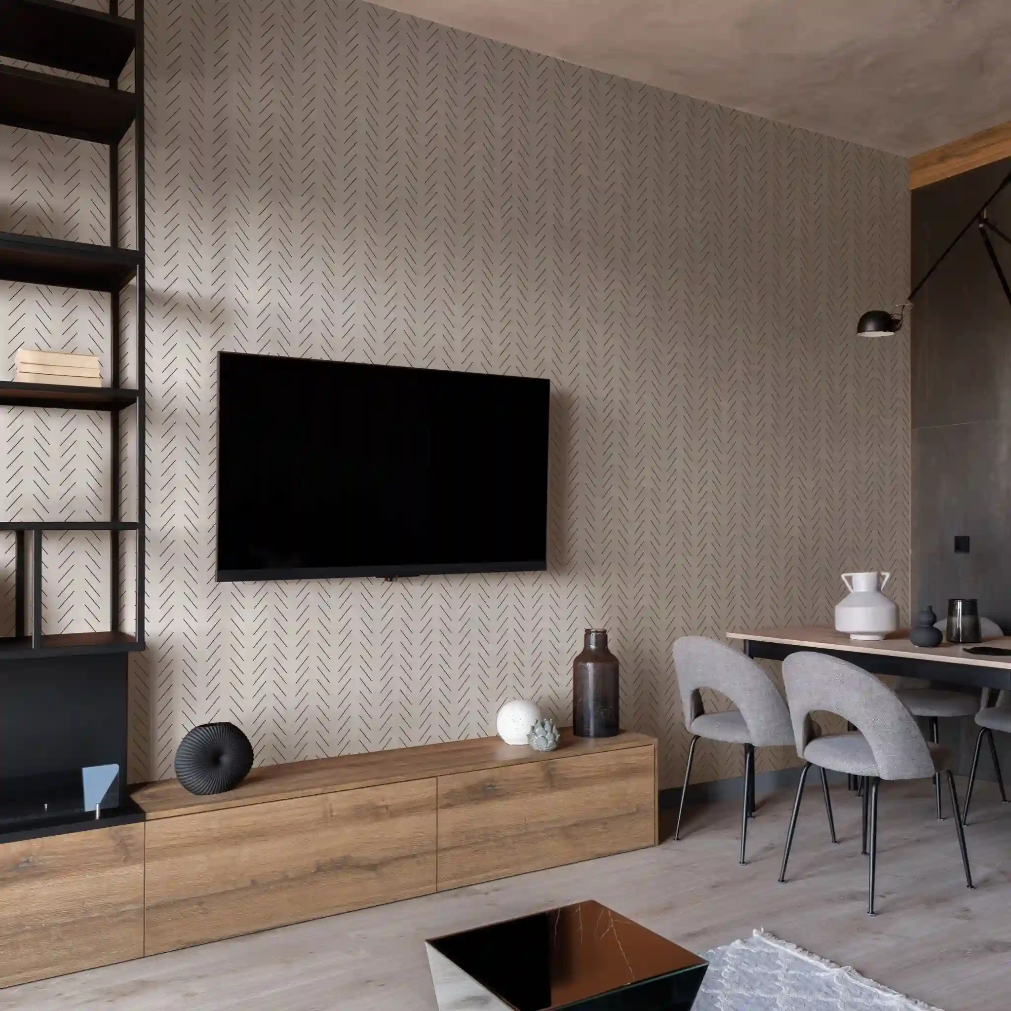 Wallpapered interior with a carefully composed patterned wall